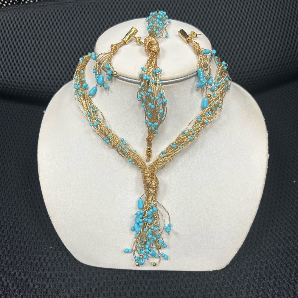 18kt silk gold necklace, bracelet, and earring set